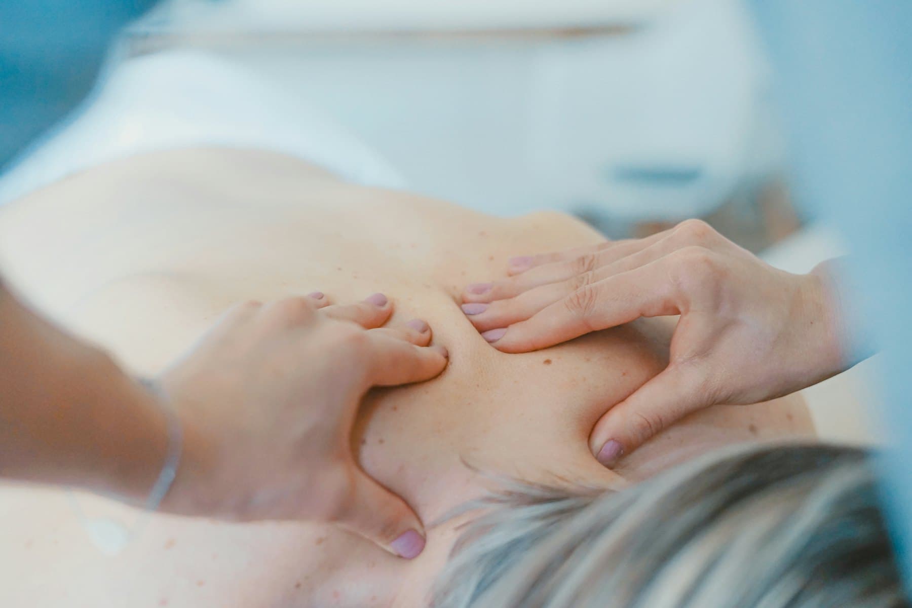 A physiotherapist treating a patient